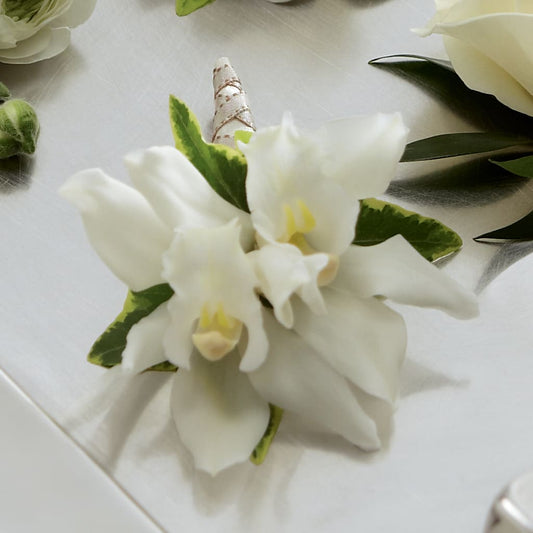 White Mini Cymbidium Boutonniere –  Peonia Flowers Llc, Lakewood NJ